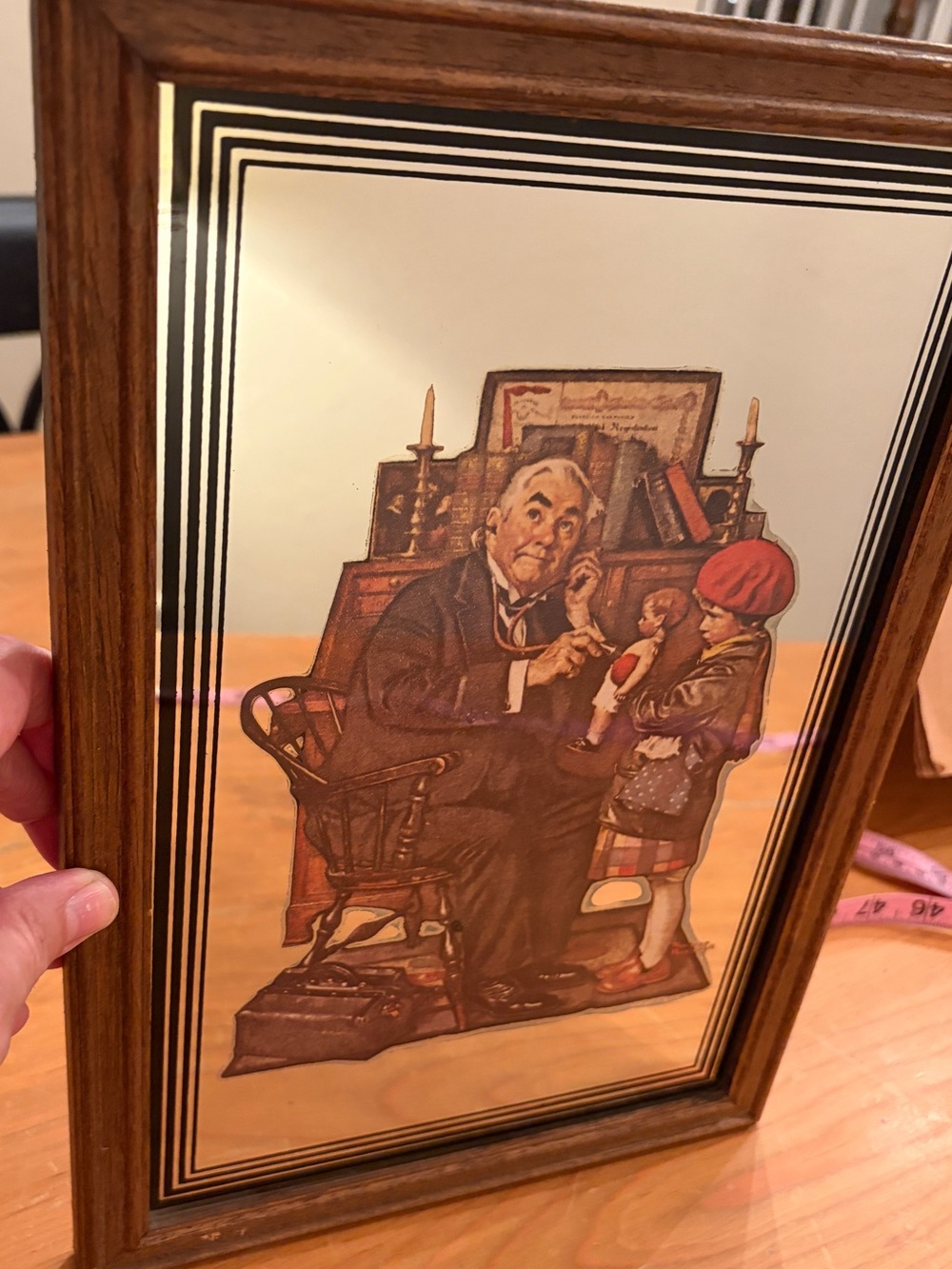 Vintage pictorial mirror of Norman Rockwell's "Doctor and the Doll". Beautiful!